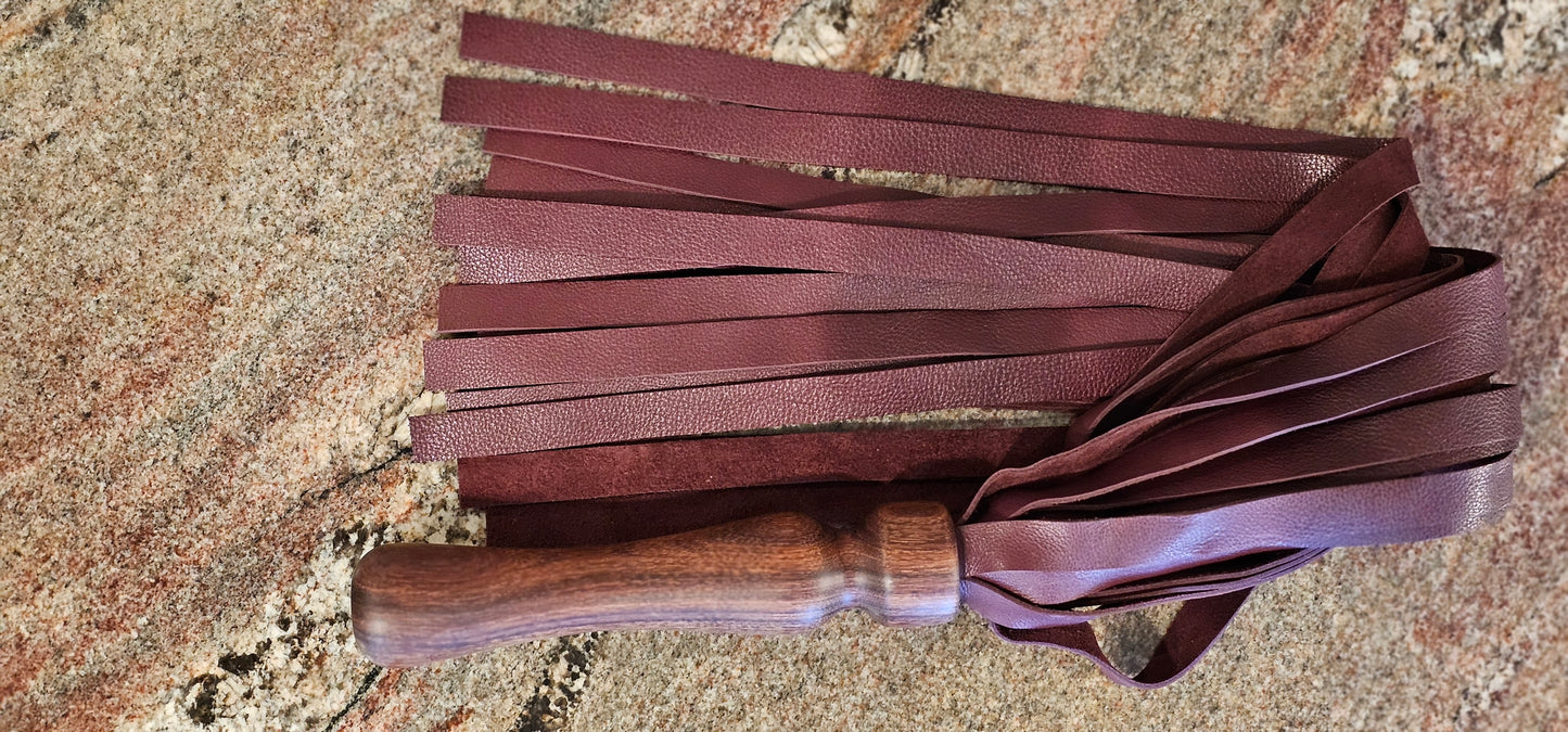 Walnut handle flogger with Maroon leather falls