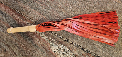 Penis Birch Handle Flogger with Reddish Orange Leather falls