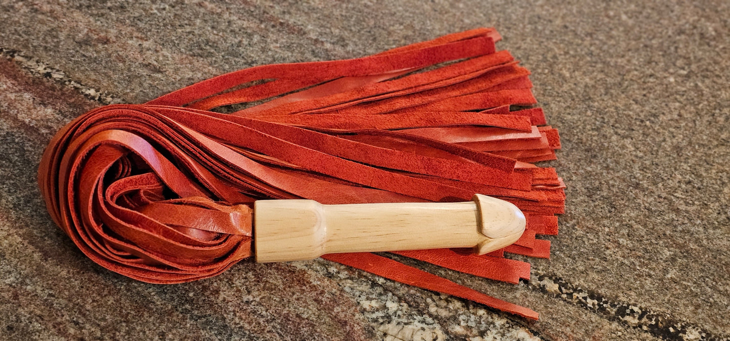 Penis Birch Handle Flogger with Reddish Orange Leather falls